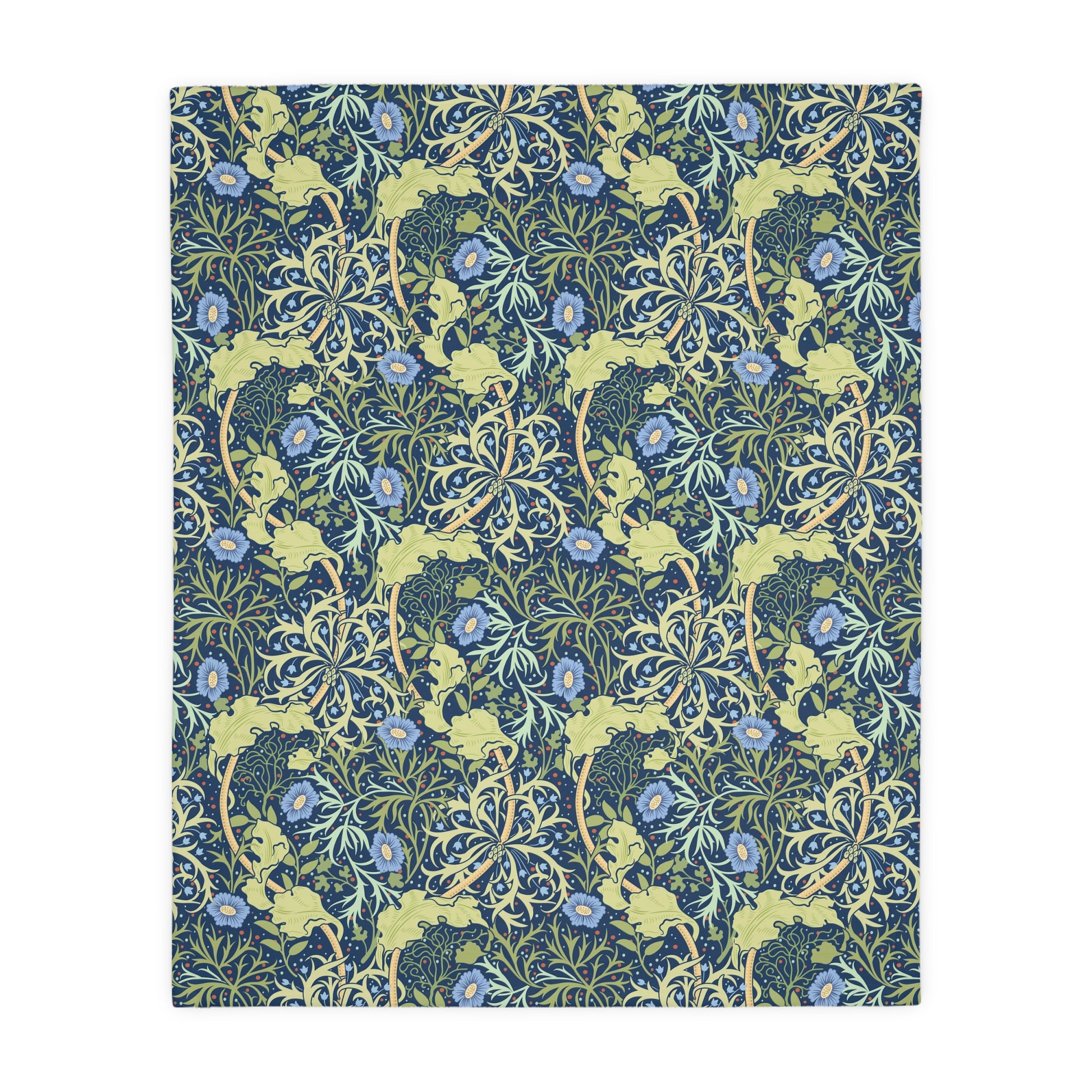 A Luxury Velveteen Minky Blanket with a two-sided print featuring a seaweed-inspired William Morris & Co floral pattern in blue, green and yellow tones.