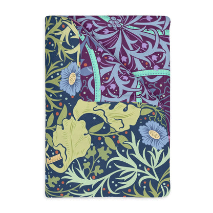 A Luxury Velveteen Minky Blanket with a two-sided print featuring a seaweed-inspired William Morris & Co floral pattern in blue, green and yellow tones.