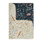 Floral and nature-themed fabric swatch with birds and leaves on a white background