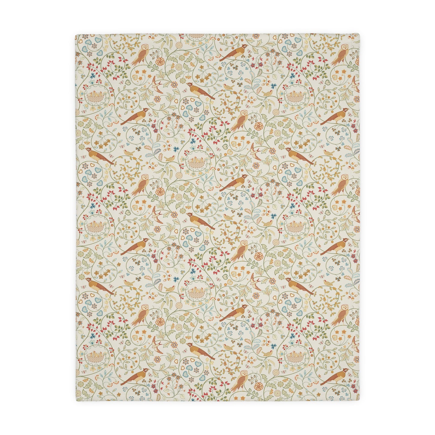 Patterned William Morris & Co blanket with birds and flowers on a white background