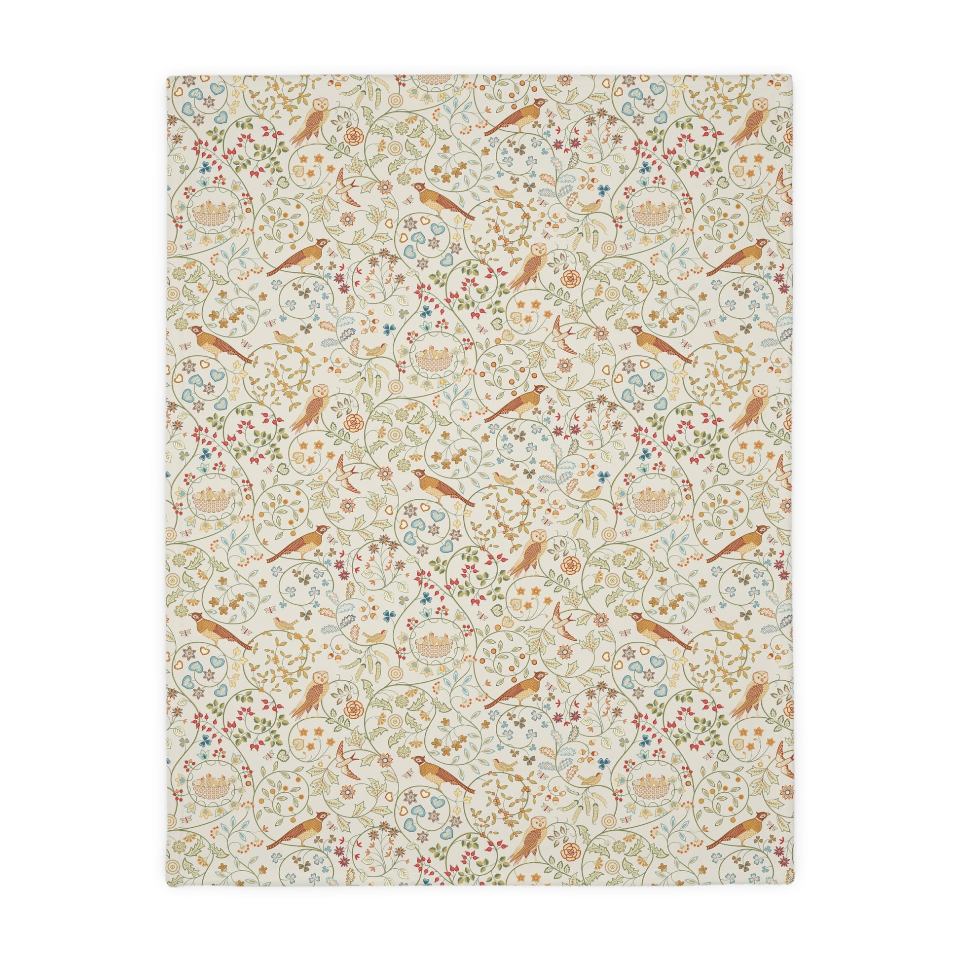Floral and bird William Morris & Co patterned blanket on a white background