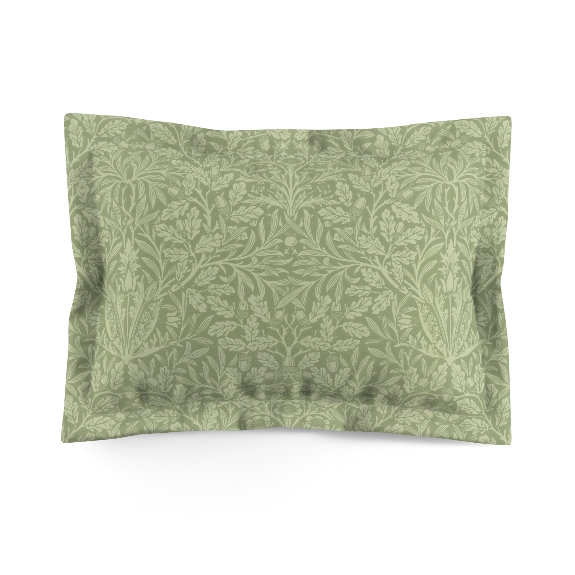 A green pillow sham with a floral pattern inspired by William Morris's classic designs.
