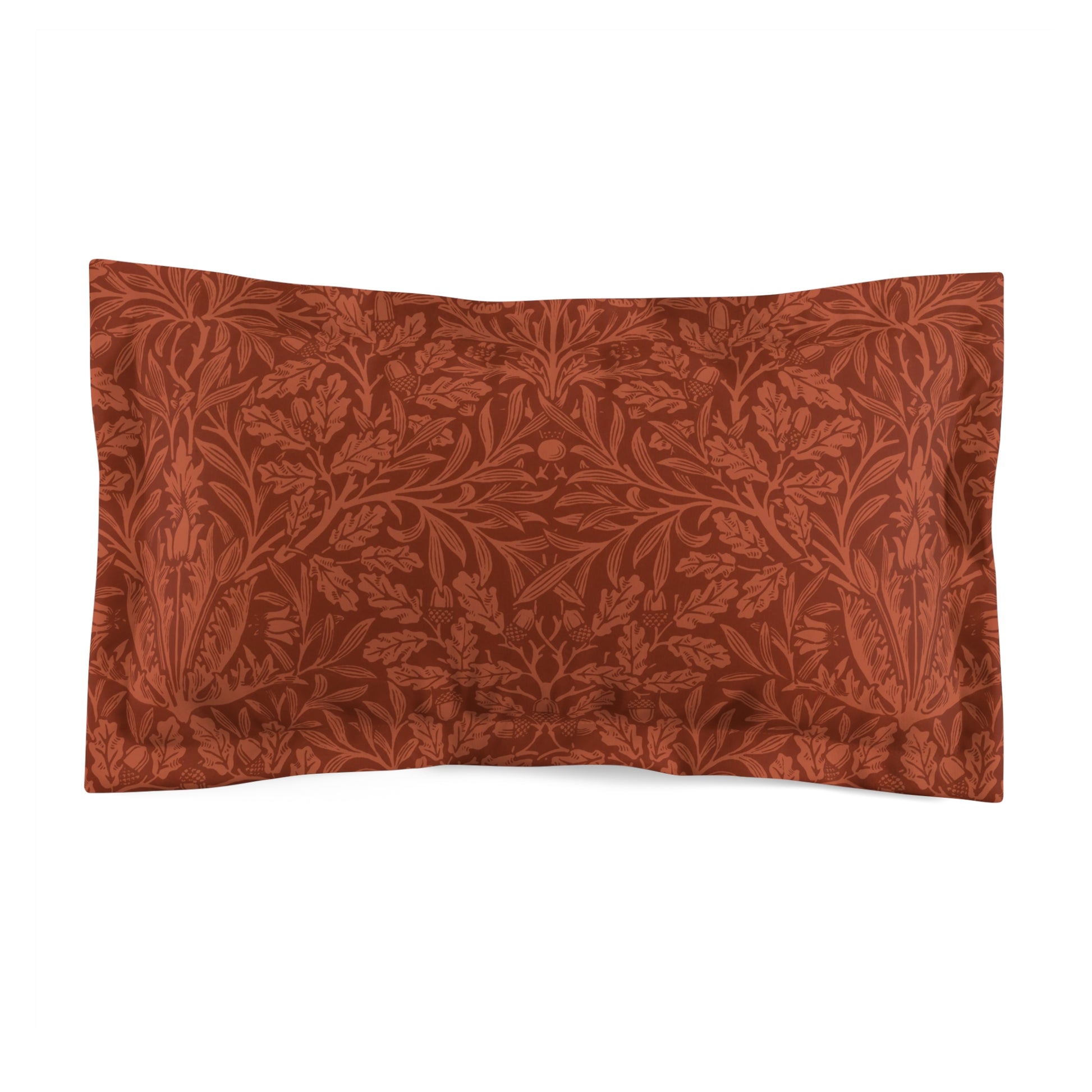 A rectangular pillow sham with a floral acorn and oak leaves design in a rust color on a white background.