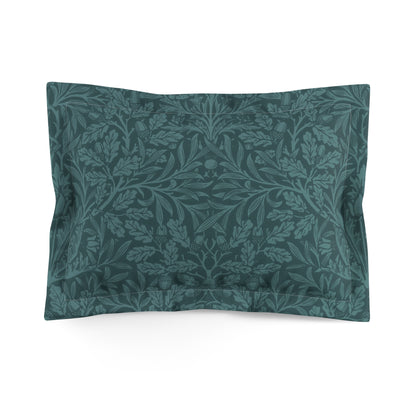 A rectangular pillow sham with a floral design in teal colour on a white background.