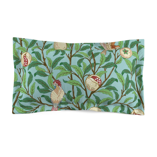 Pillow sham with a floral design featuring birds and pomegranates on a Tiffany blue background.