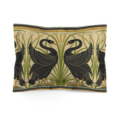 Decorative pillow with black swan design on a beige background
