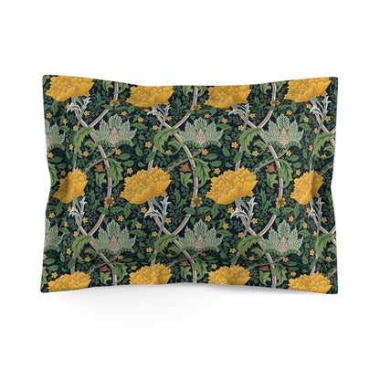 Pillow sham with a floral design inspired by William Morris, featuring yellow chrysanthemums on a dark green background, with a traditional decorative edging.