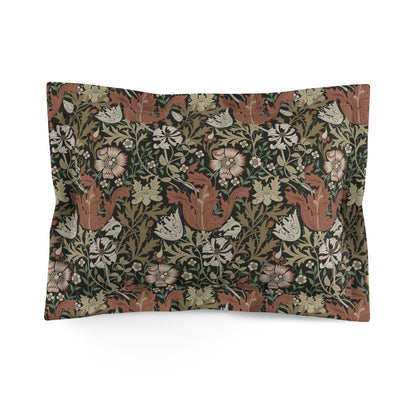 Pillow sham with a floral pattern in shades of green, brown, and beige.
