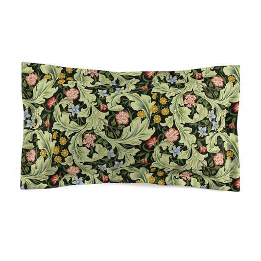 Pillow sham with a floral design inspired by William Morris in green, with a cream-colored back.