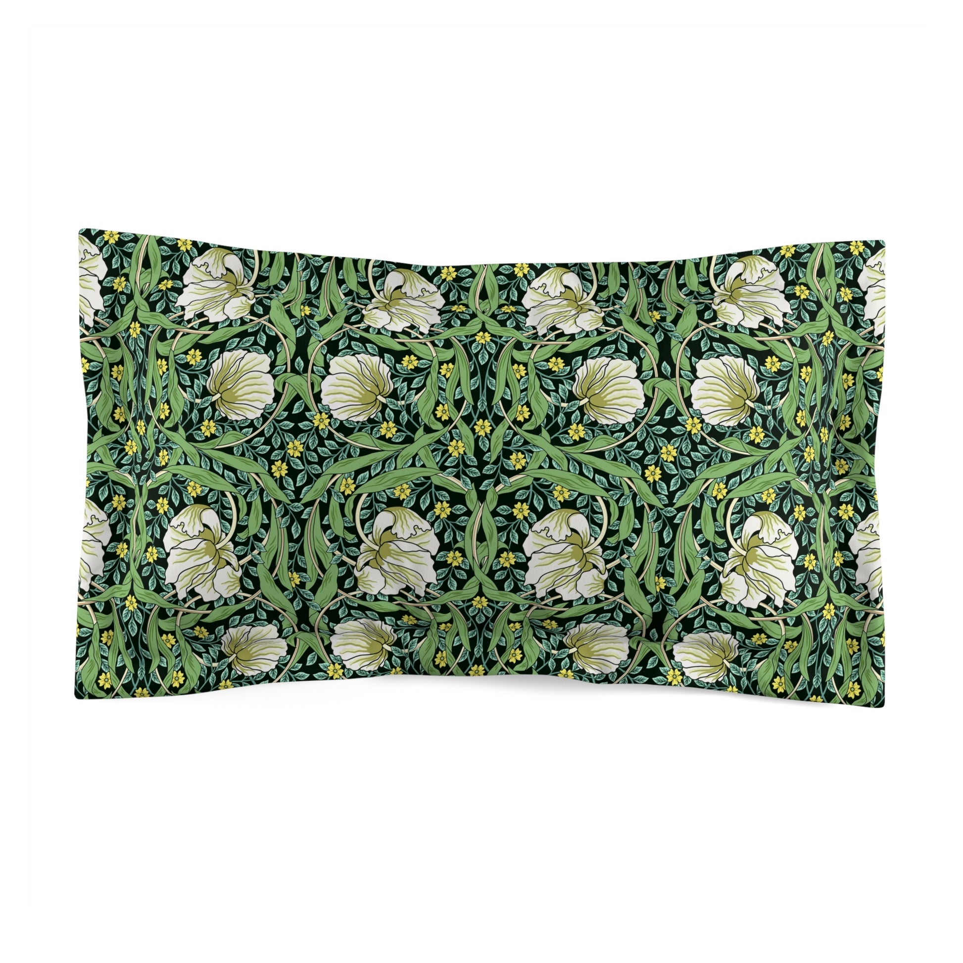 Pillow sham with a floral design inspired by William Morris in green and white colors on a king-sized bed.
