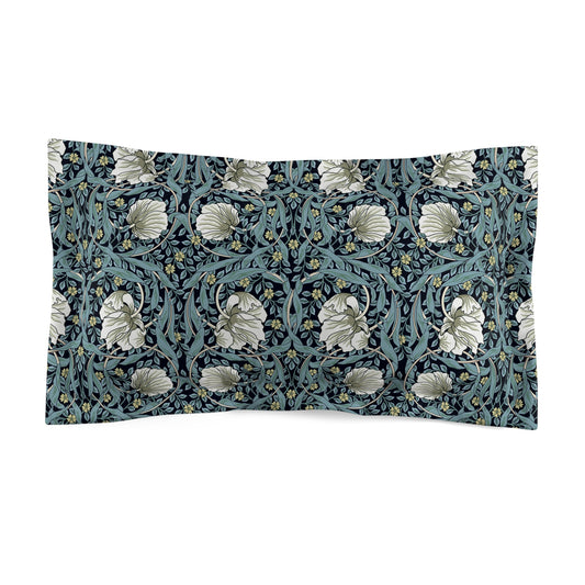 Pillow sham with a floral design inspired by William Morris in a slate blue color on a white background.