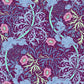 A rectangular pillow sham with a floral design in pink and green on a purple background, inspired by William Morris.