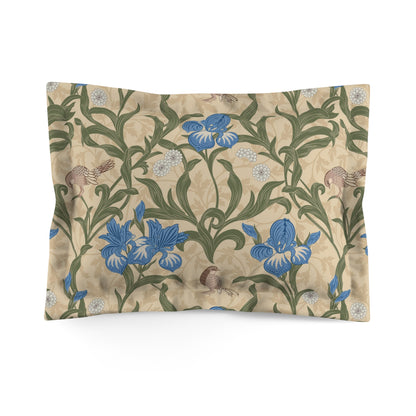 Pillow sham with a floral design inspired by William Morris in blue, beige, and green colors on a cream background.