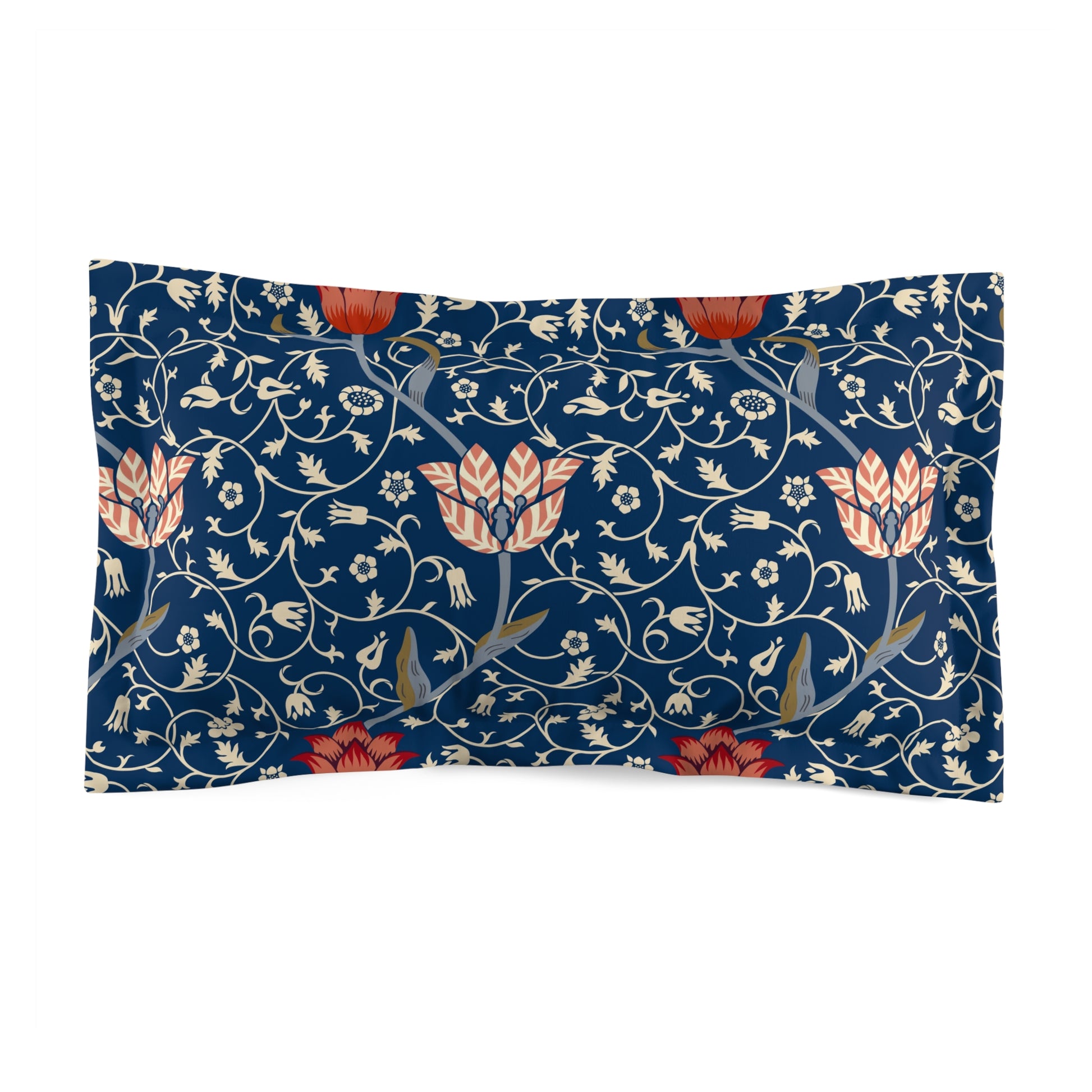 Pillow sham with a floral design inspired by William Morris, in blue, red, and white colors on a king-sized bed.