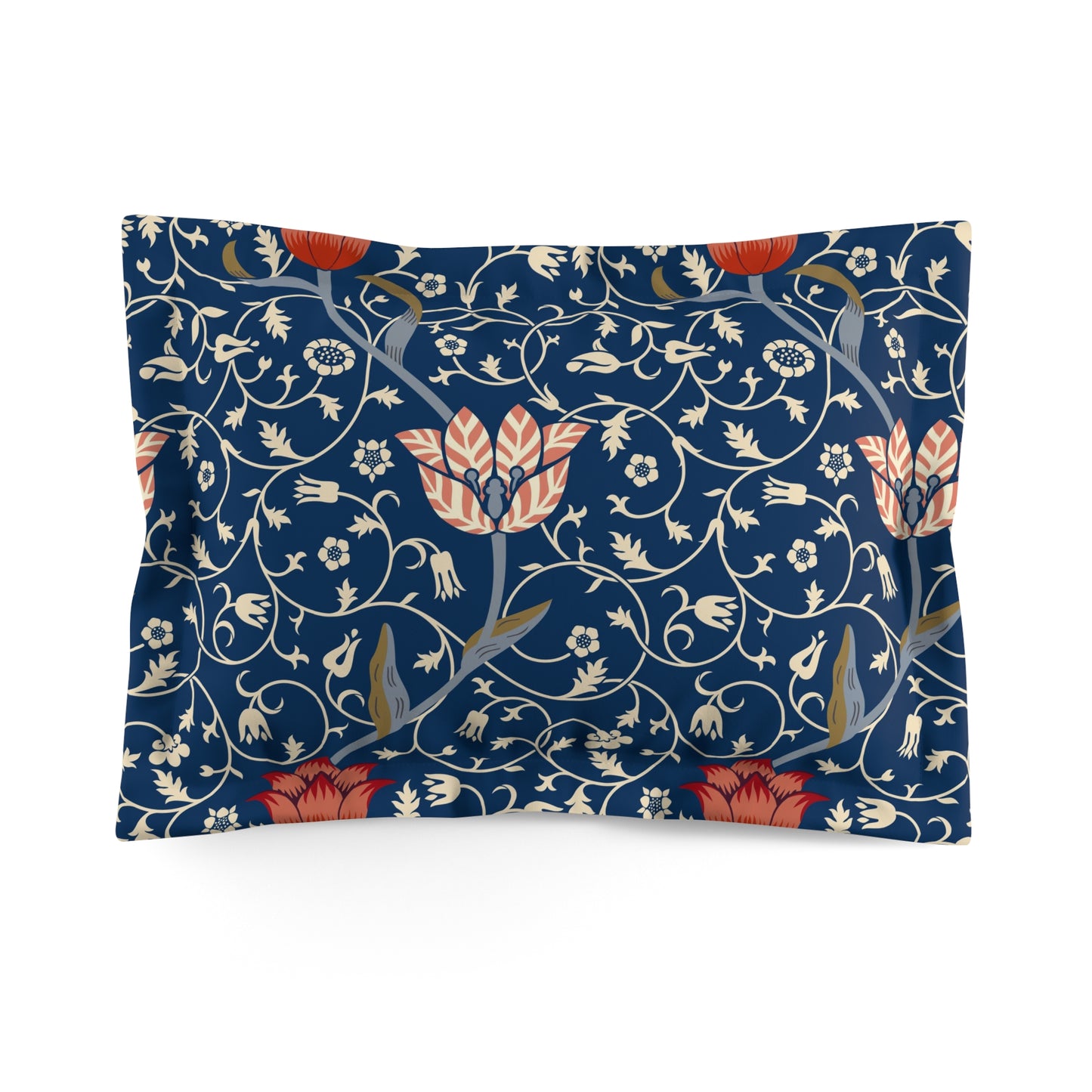 Pillow sham with a floral design inspired by William Morris, in blue, red, and white colours on a king-sized bed.