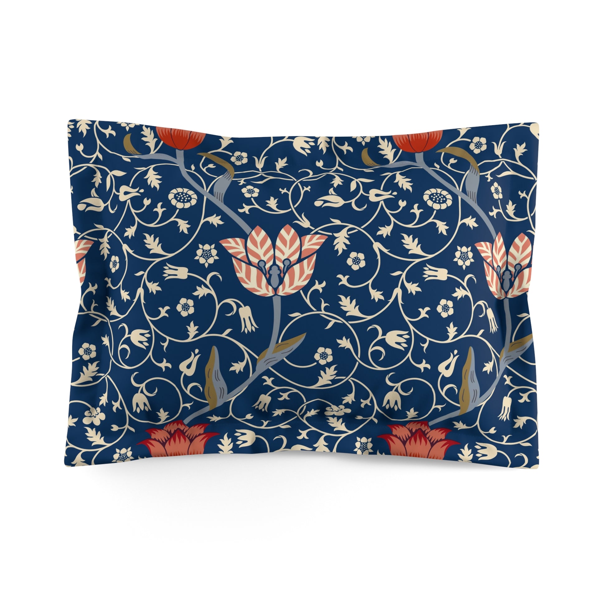 Pillow sham with a floral design inspired by William Morris, in blue, red, and white colours on a king-sized bed.