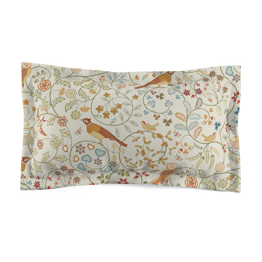 Floral and bird patterned pillowcase on a white background