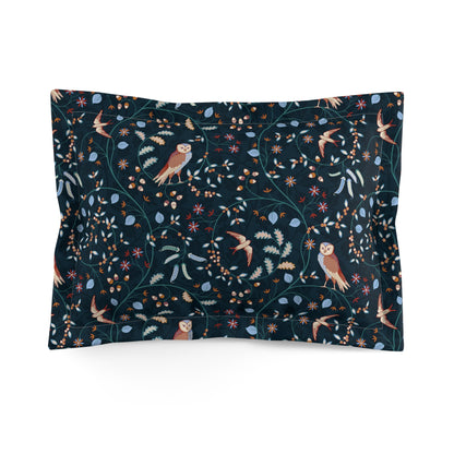Pillowcase with nature-themed design featuring birds and plants on a dark background