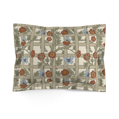 Decorative pillow with floral and butterfly pattern on a beige background