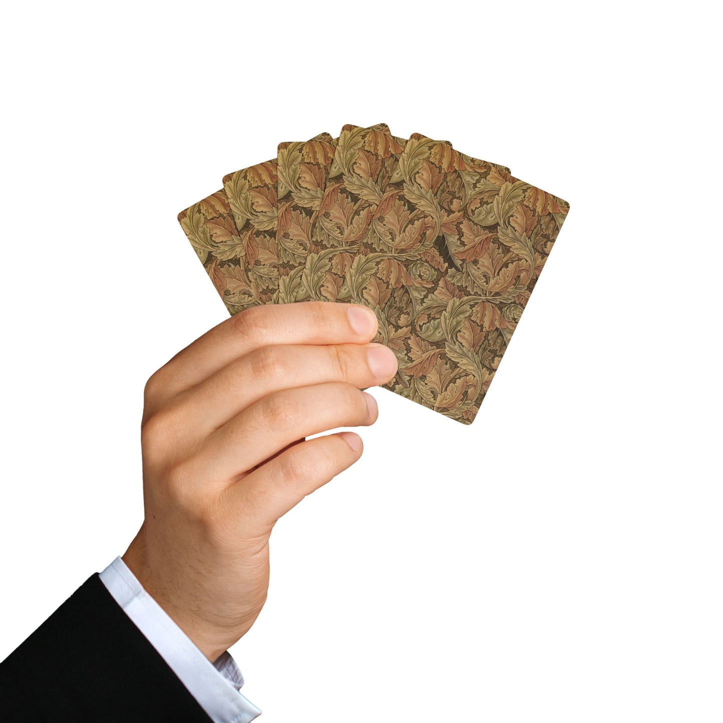 Hand holding a set of playing cards with a leaf pattern on a white background