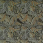Decorative fabric pattern with leaf designs in brown, beige, and gray.