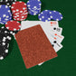 Poker chips and cards on a green felt surface