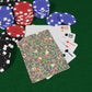Poker chips and playing cards on a green felt surface