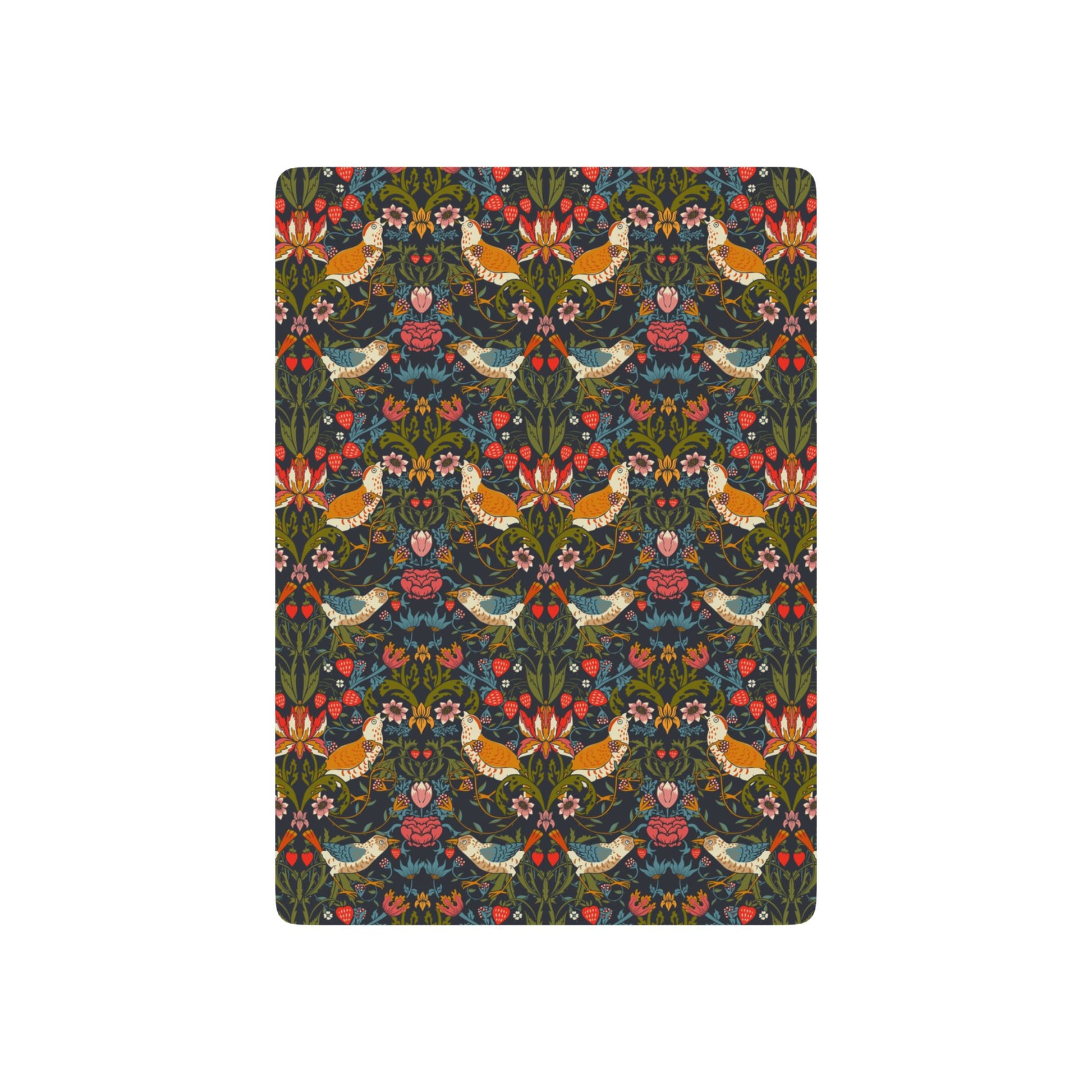 Patterned playing cards with birds and flowers on a dark background