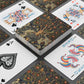 Playing cards with intricate designs on a gray surface
