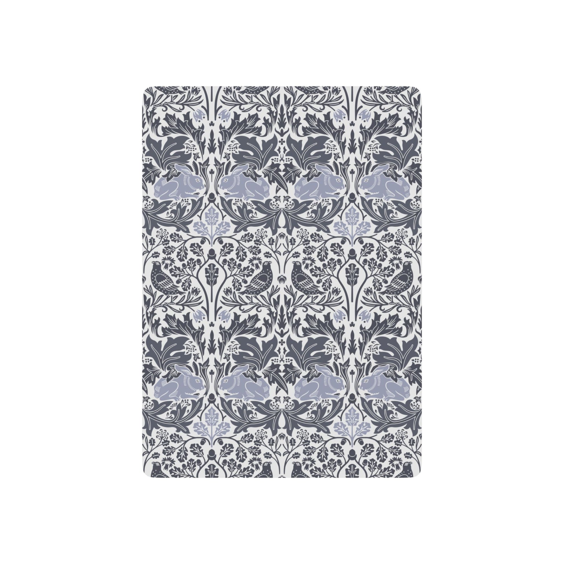Decorative playing cards with a floral pattern on a white background