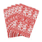 Red and white floral patterned paper bags on a white background