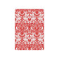 Notebook with red and white floral pattern on a white background