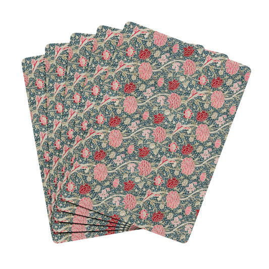 Stack of floral patterned paper sheets on a white background