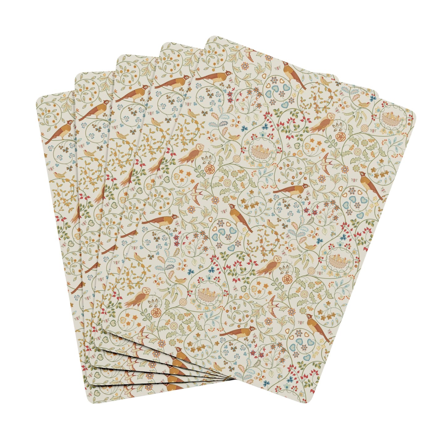 Set of playing cards with floral and bird pattern on a white background