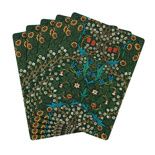 Set of four playing cards with floral and bird design on a green background