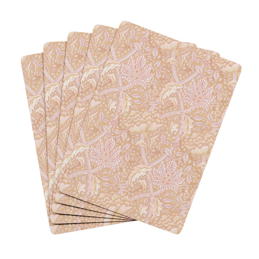 Set of five floral-patterned notebooks on a white background