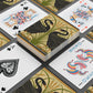 Playing cards with decorative designs on a black background