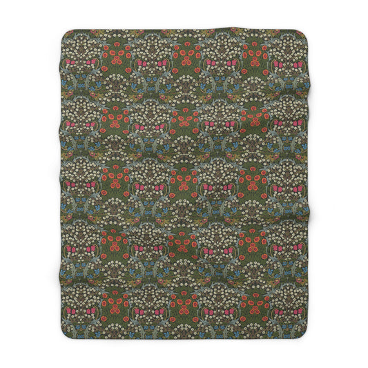 A cozy Sherpa Fleece Blanket with a geometric William Morris & Co pattern in a mix of dark and vibrant colours, laid out flat.