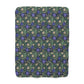 Floral patterned fabric with blue flowers and green leaves on a white background