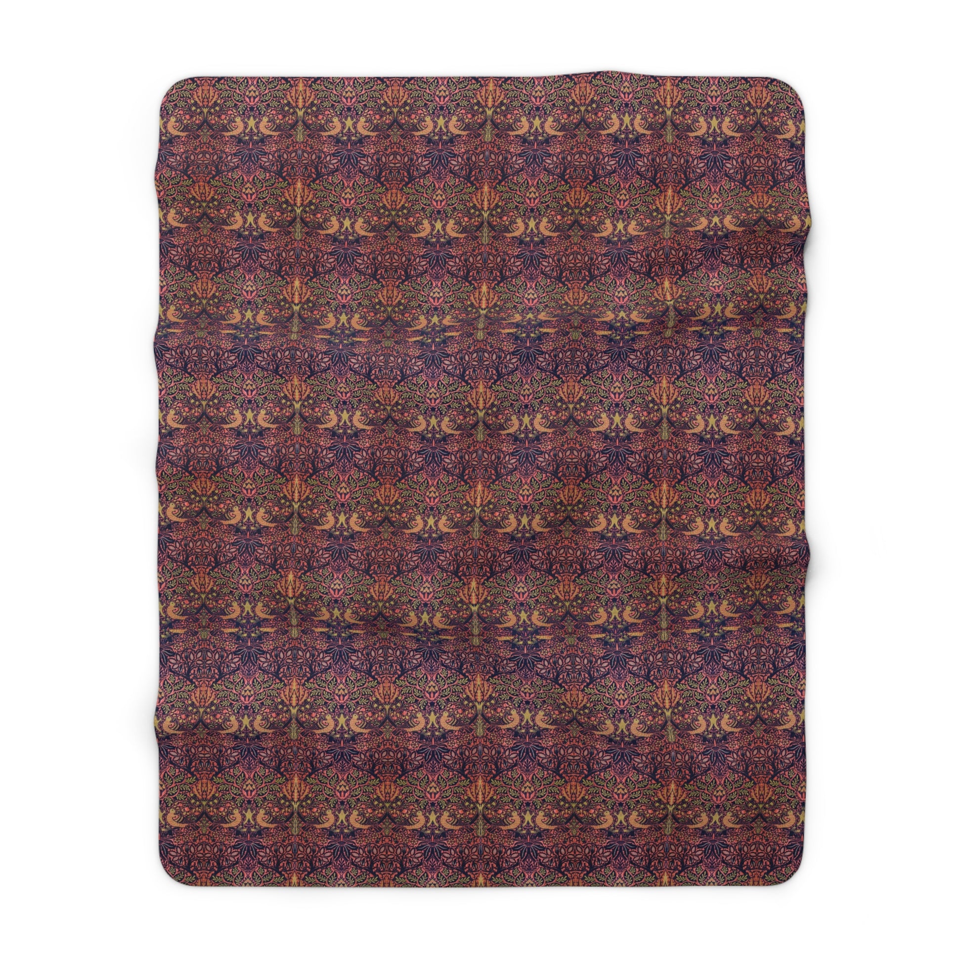 A plush fleece blanket with a floral William Morris & Co pattern in purple, pink and cream colours, folded neatly.