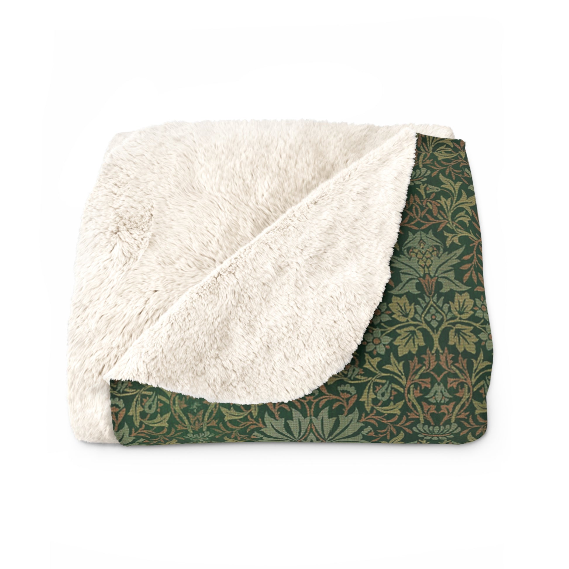 A plush fleece blanket with a floral pattern in green tones, laid flat.