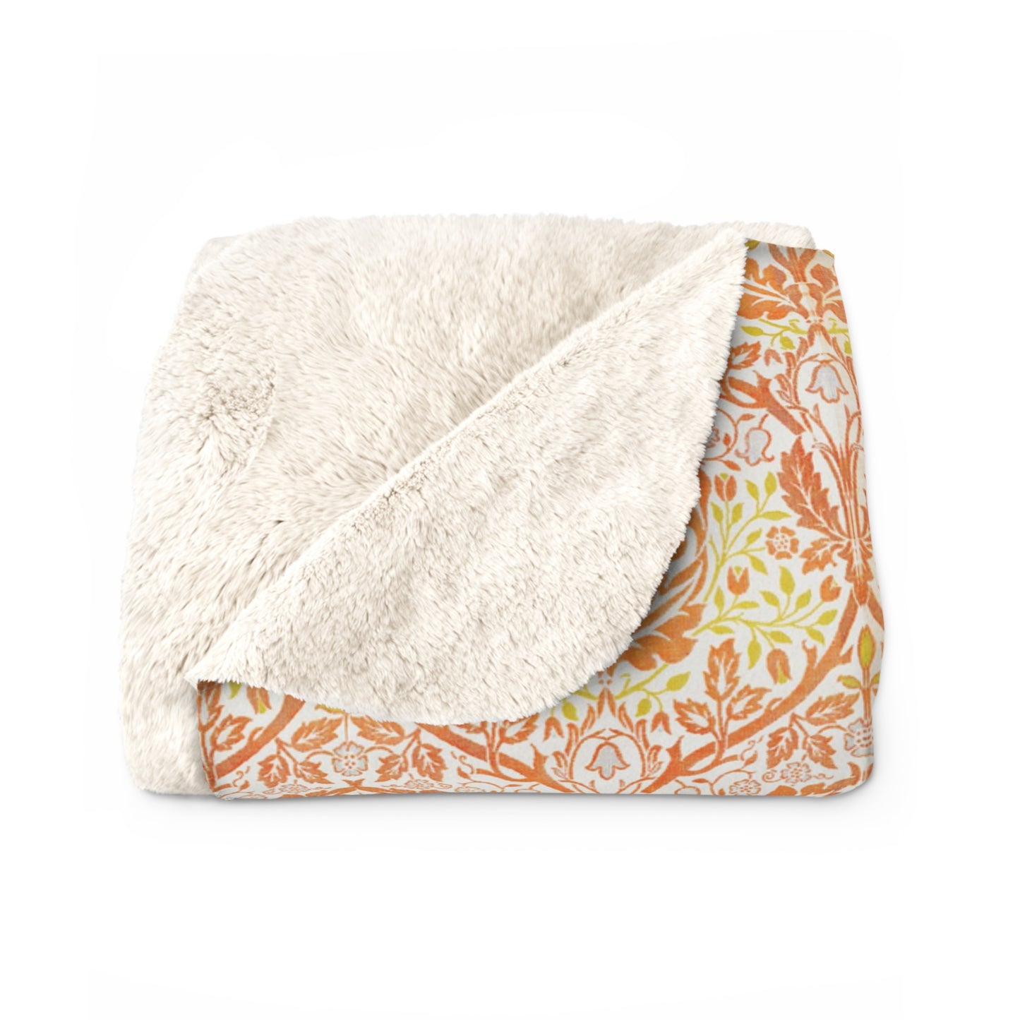 A plush fleece blanket with a geometric pattern in orange and cream colors, laid out flat.
