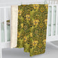 Floral patterned fabric draped over a white bed frame