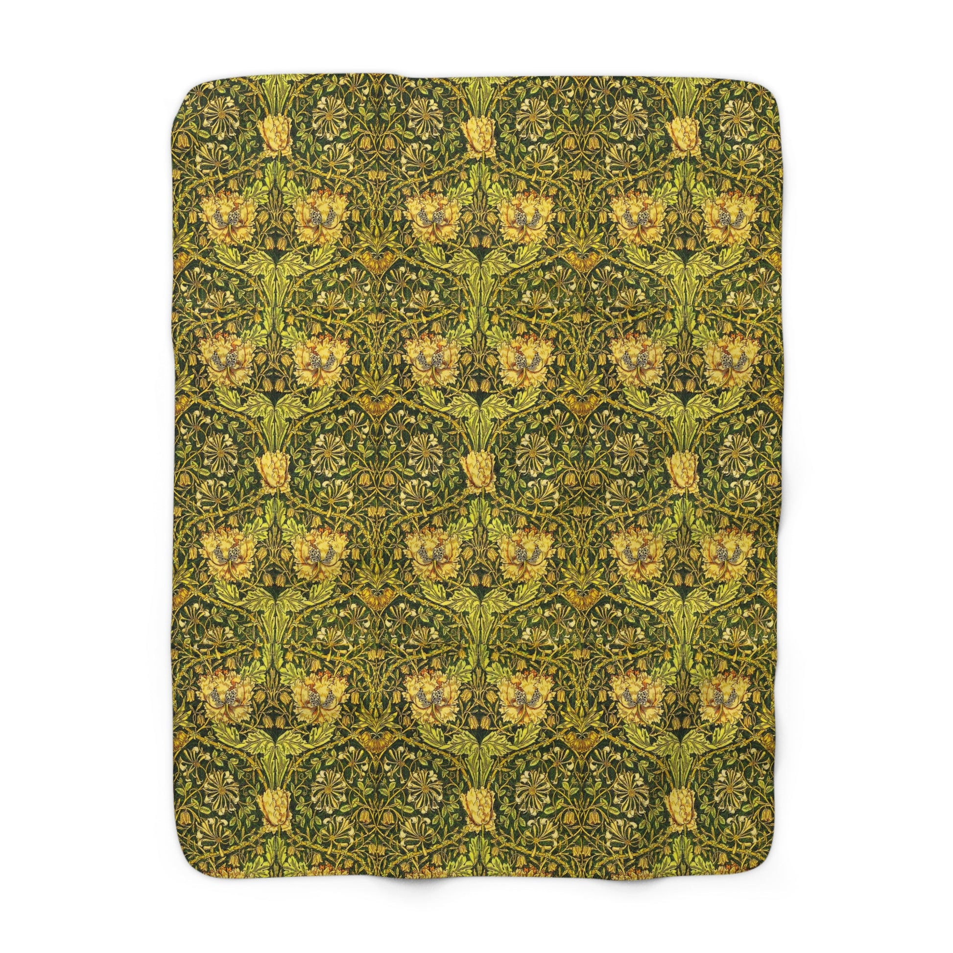 Green patterned blanket with a floral design on a white background