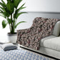 A plush fleece blanket with a floral William Morris & Co pattern in mocha colour.