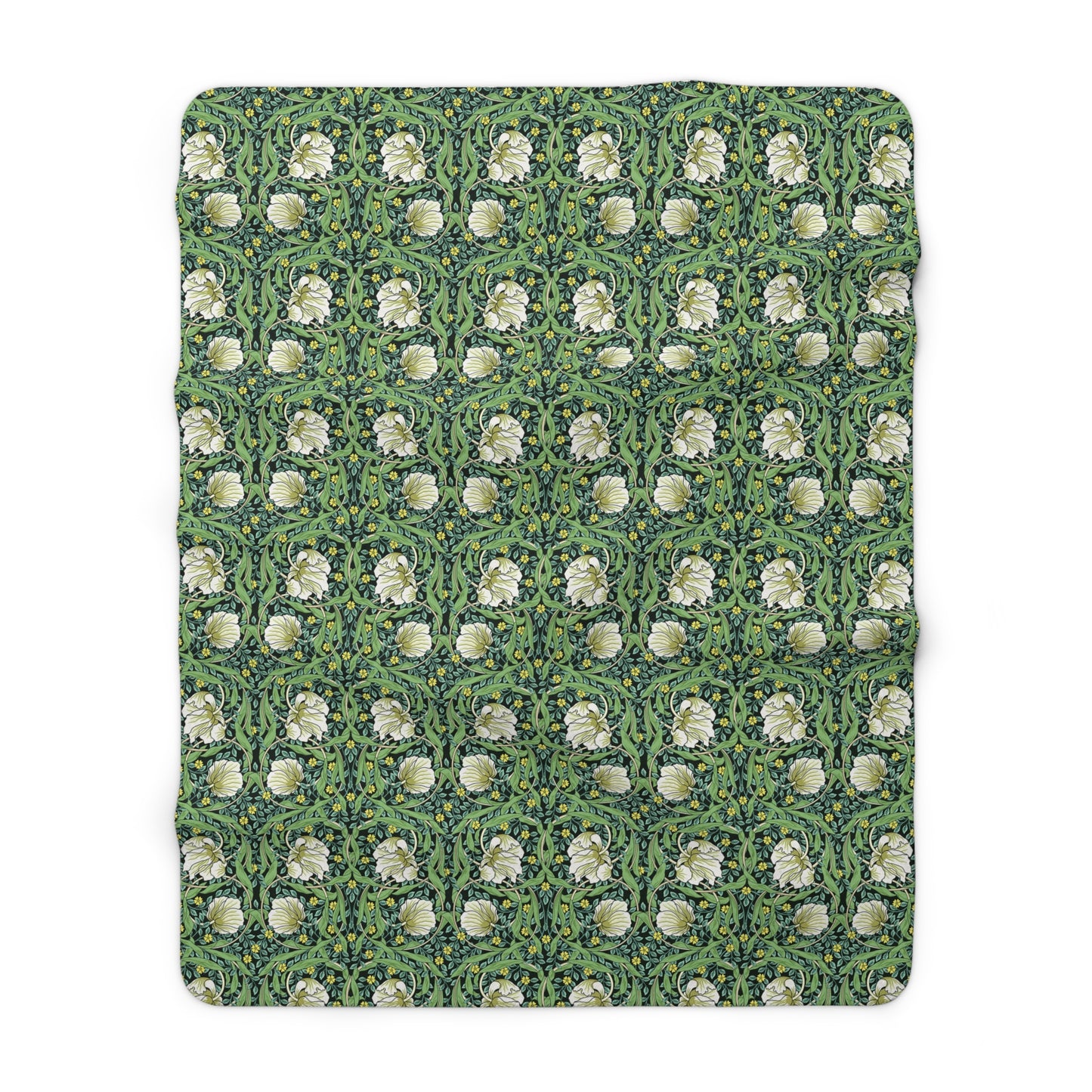 A green Sherpa fleece blanket with a floral pattern inspired by William Morris.
