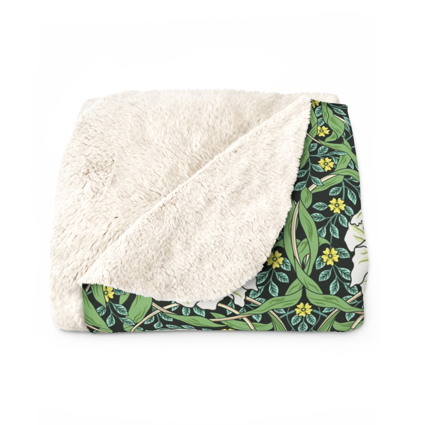 A green Sherpa fleece blanket with a floral pattern inspired by William Morris.