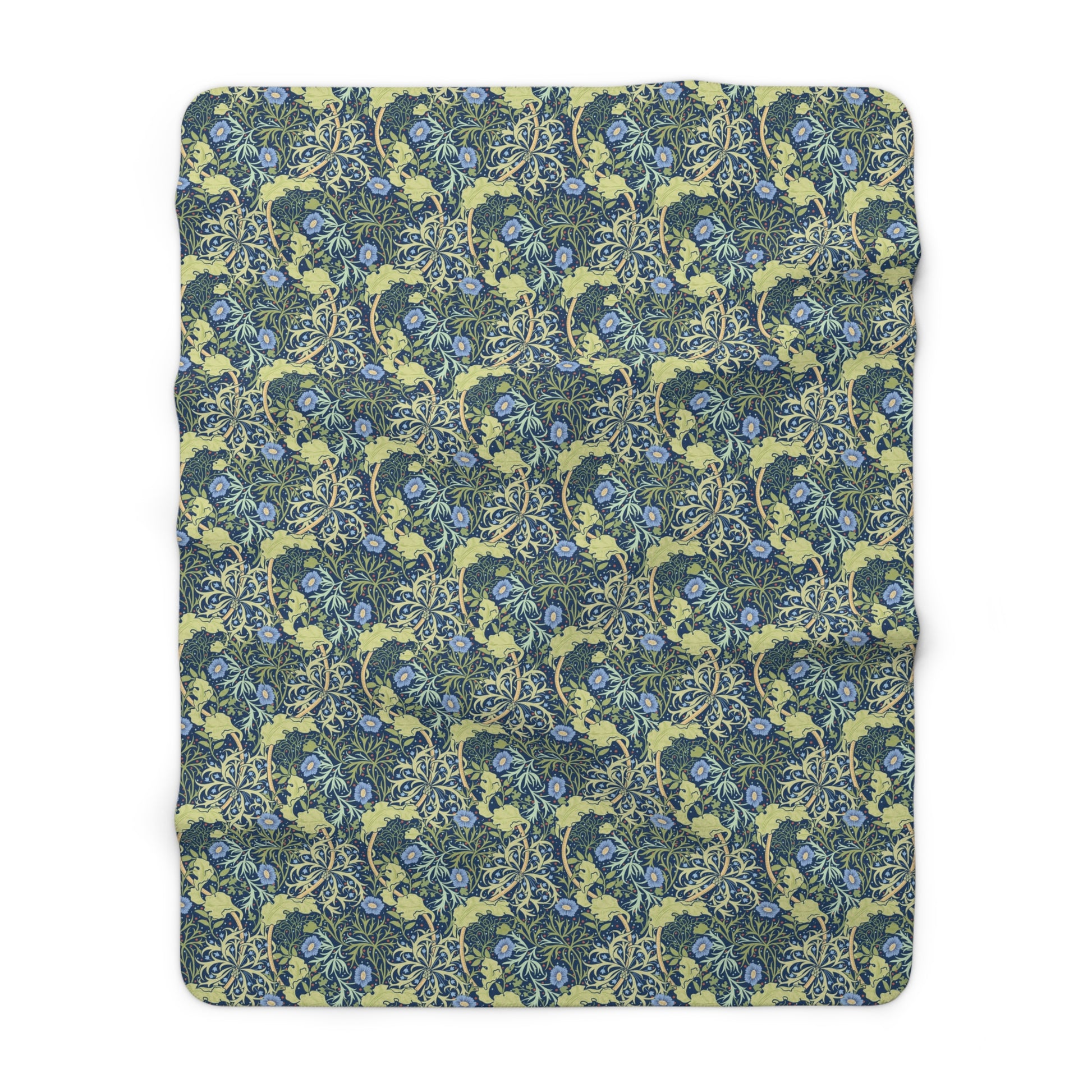 A rectangular Sherpa fleece blanket with a floral pattern in blue and yellow shades, inspired by William Morris & Co