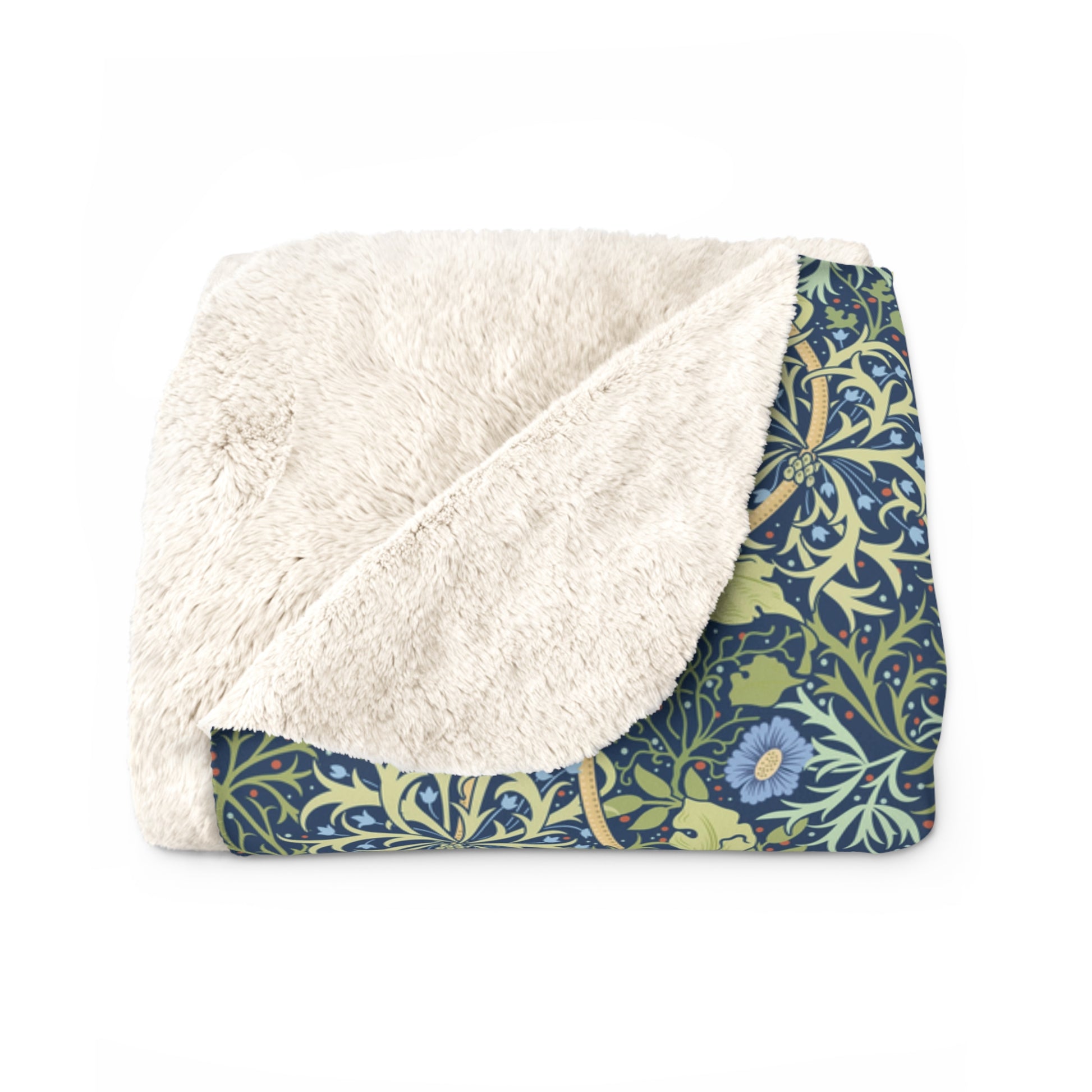 A rectangular Sherpa fleece blanket with a floral pattern in blue and yellow shades, inspired by William Morris & Co