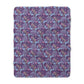 A rectangular Sherpa fleece blanket with a floral William Morris & Co pattern in pink and purple colours.